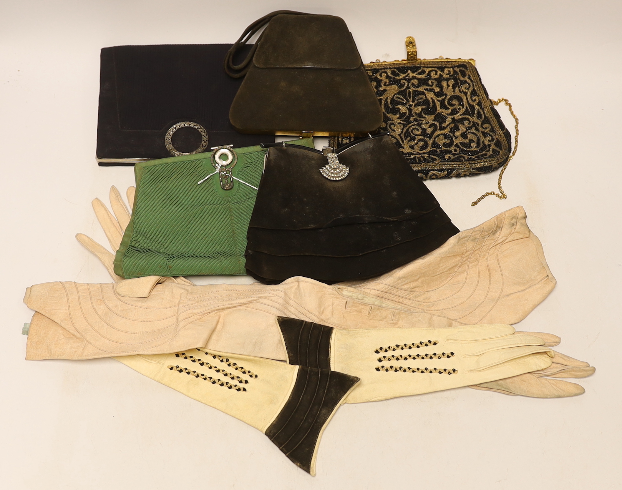 Five ladies evening bags 1930's-40's, together with a pair of pink leather evening gloves and a similar pair of ladies gauntlet gloves